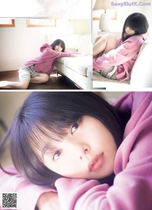 A woman laying on top of a bed next to a pillow.